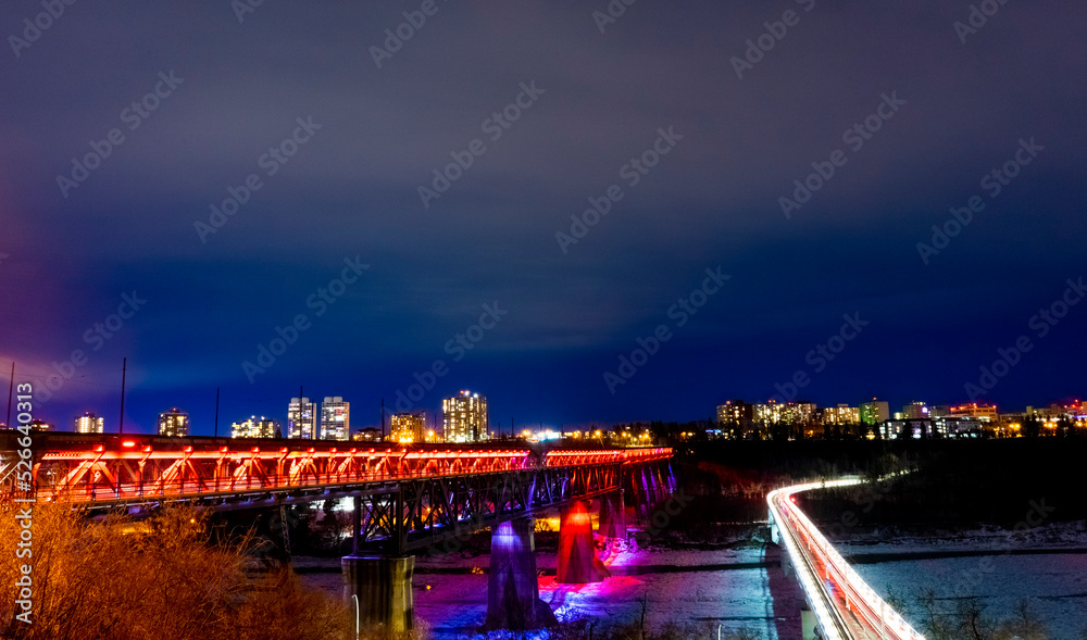 Fototapeta premium high level bridge and lrt bridge timelapse at night