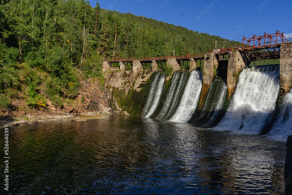 Dam. Waterfall. Natural historical complex 