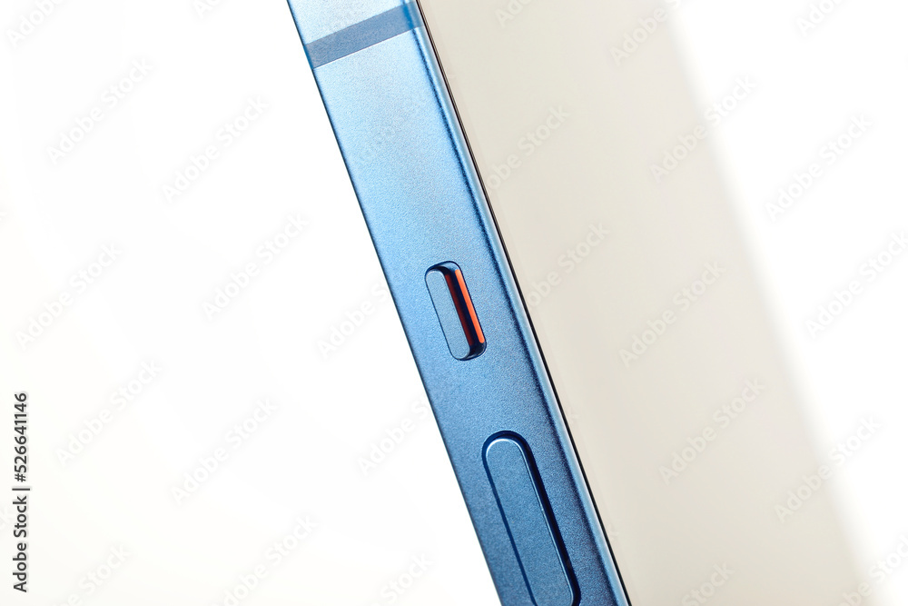 Alert slider on smartphone isolated on white background, phone silent switch Alert slider on smartphone isolated on white background, phone silent switch