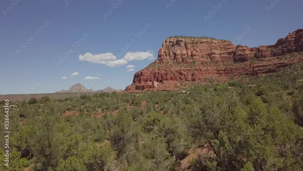 flying over treetops tward red rock mountain sedona arizona flying over treetops tward red rock mountain sedona arizona