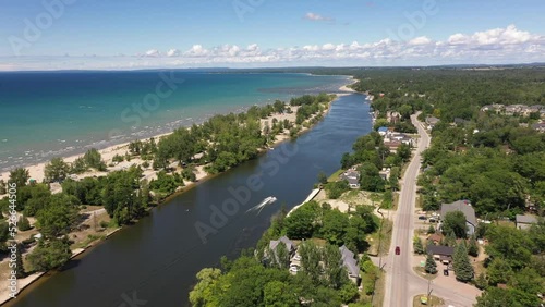 jet ski in wasaga beach  summer time blue skies shore line phone screen size  photo