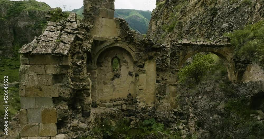 Pullback Through Weathered Rocks Of Tmogvi Fortress Ruins In Aspindza, Georgia. Aerial Shot Pullback Through Weathered Rocks Of Tmogvi Fortress Ruins In Aspindza, Georgia. Aerial Shot