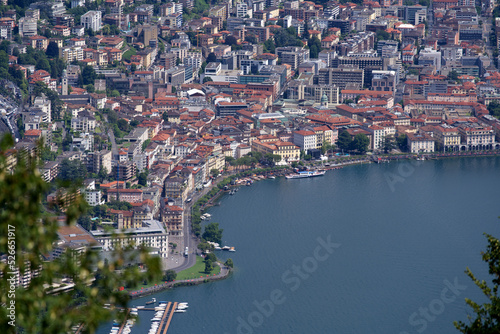 Aerial view of City of Lugano seen from local mountain San Salvatore on a sunny summer day. Photo taken July 4th, 2022, Lugano, Switzerland.