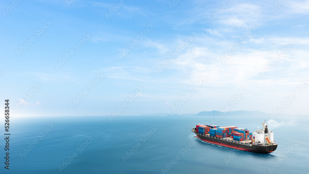 Container cargo ship in the ocean at sunset blue sky background with copy space, Nautical vessel and sea freight shipping, International global business logistics transportation import export concept - obrazy, fototapety, plakaty 