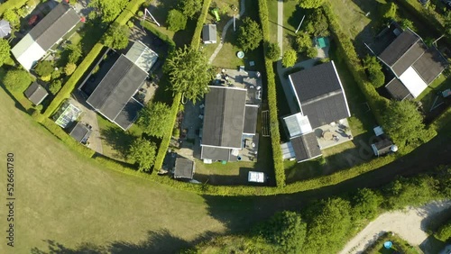 Top Down Aerial View of Tiny Homes Built into Circular Garden Community or City in Denmark with a Focus on Sustainable Lifestyles good for Planet Earth photo