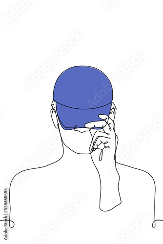 man pulling his cap over his head - one line drawing vector. the concept of trying on a baseball cap, going outside, getting ready for a project or job
