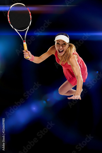 Dynamic portrait of young emotional sporty woman playing tennis © Denys Kurbatov