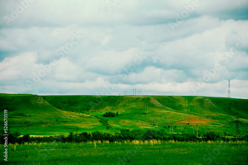 landscape with grass and clouds