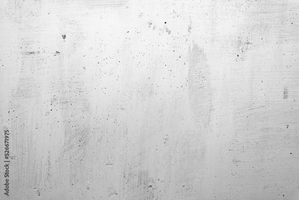 Abstract texture of a whitewashed concrete wall. White and gray background.