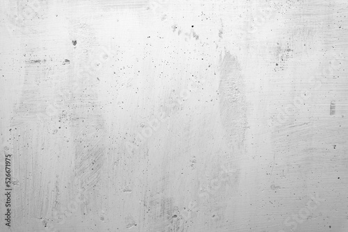 Abstract texture of a whitewashed concrete wall. White and gray background.