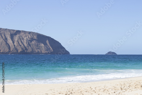Playa de las Conchas with Mount Clara in the background. The island La Graciosa  Lanzarote  Canary Islands  Spain