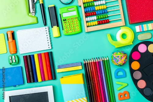 Back to school background. Stationery colorful items, flat lay top down view