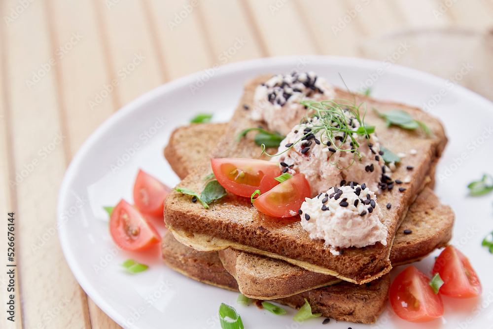 Seasonal sandwiches with sourdough bread, tomatoes, herbs, quinoa and vegan sause. Healthy vegan breakfast Seasonal sandwiches with sourdough bread, tomatoes, herbs, quinoa and vegan sause. Healthy vegan breakfast
