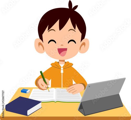 タブレットを使い学習する男の子の笑顔
