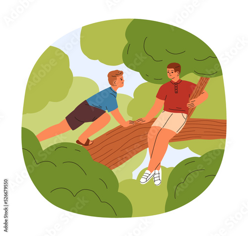 Boys friends climbing up tree. Children on branch among leaves on summer holi...