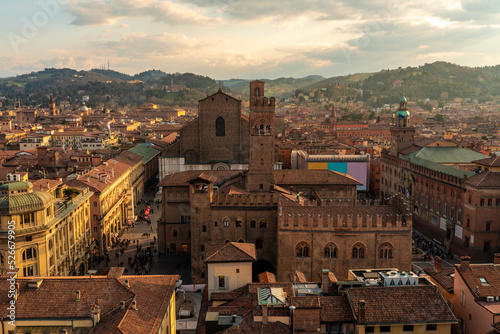 Italy, Emilia-Romagna, Bologna, Palazzo Re Enzo, Basilica of San Petronio and surrounding buildings of Piazza Maggiore at dusk photo