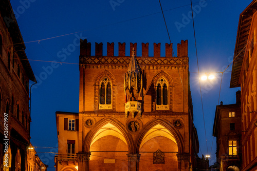Italy, Emilia-Romagna, Bologna, Facade of Palazzo della Mercanzia at night photo