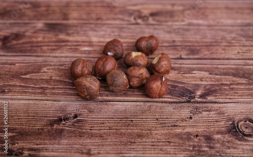 Hazelnut. Nuts on wooden background.