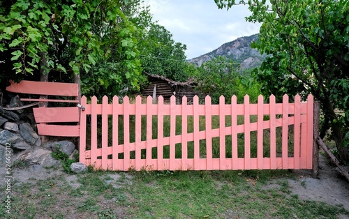 Colorful wooden garden gate.