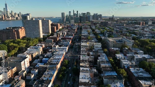 Hoboken New Jersey and aerial view toward Jersey City NJ. Lower Manhattan visible. Aerial truck shot in summer. photo