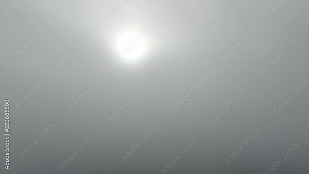 Fly up through thick cloud to clear sky with Sun above clouds. Aerial video Fly up through thick cloud to clear sky with Sun above clouds. Aerial video