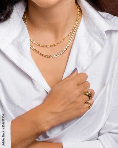 close up of a woman with jewelry