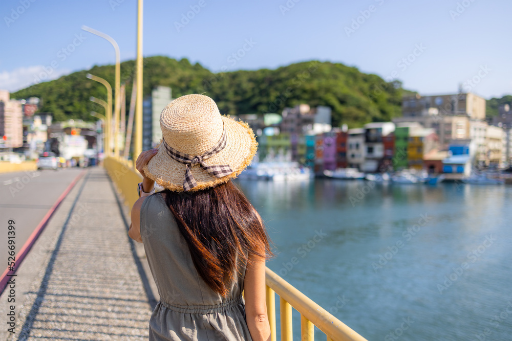 Woman visit Zhengbin Keelung harbor bay in Taiwan