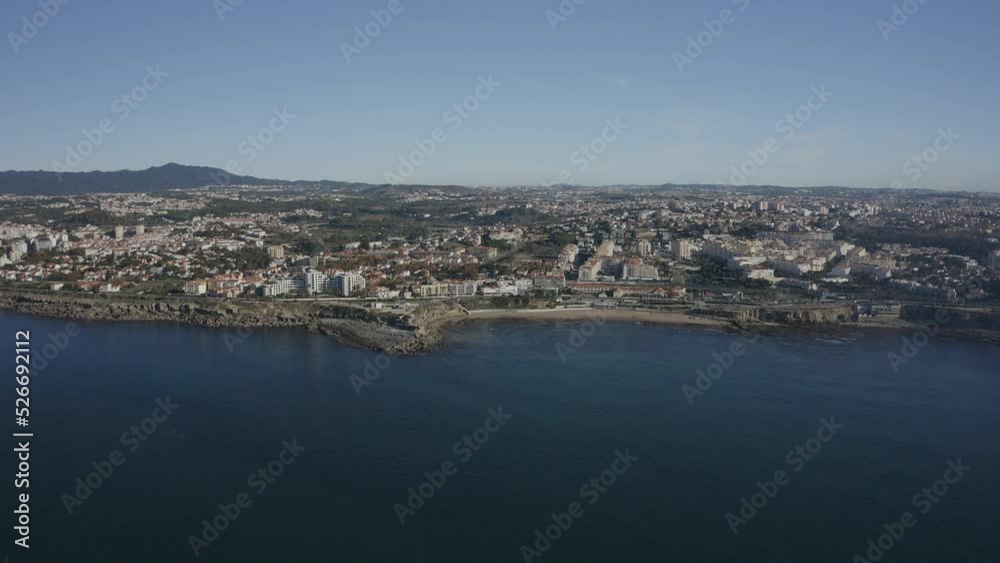 Cascais, coastal village in Estoril near of Lisbon. Portugal. Aerial Drone Footage. over sea on sunny day. sao pedro beach