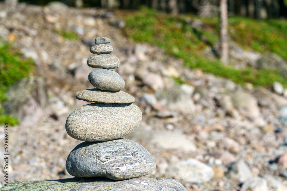 Pyramid of stones. Unstable balance of stone objects. Idyllic state of nature. Pyramid of stones. Unstable balance of stone objects. Idyllic state of nature.