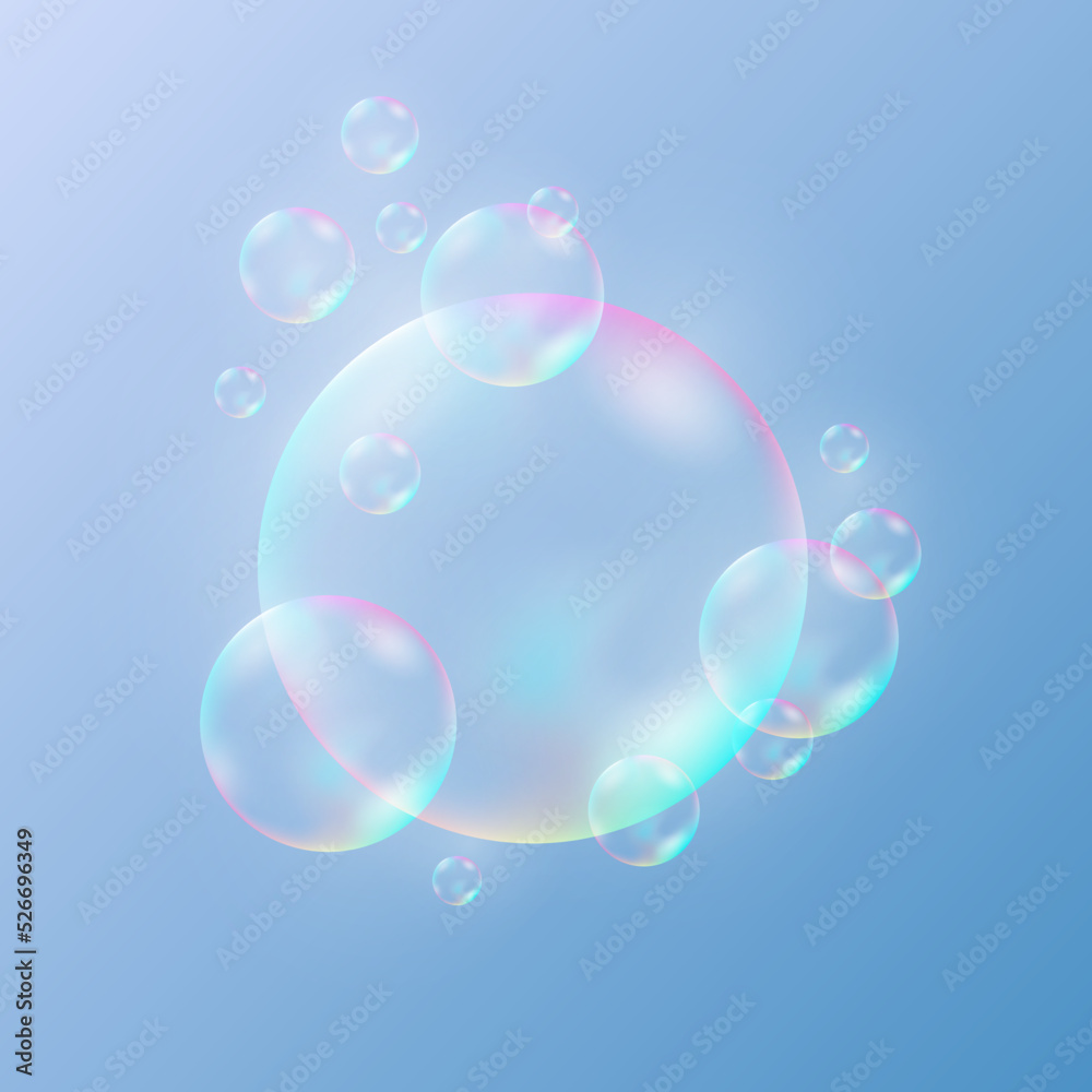 Flying transparent soap bubbles isolated on a light blue gradient