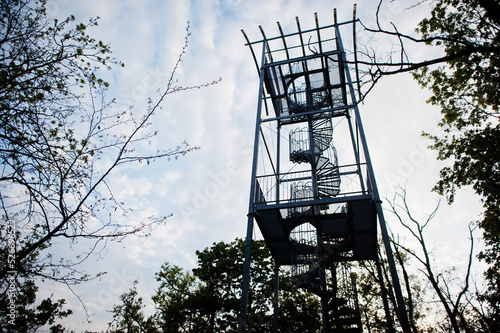 A viewing tower at Brno, Czech Republic. Watchtower during sunset with trees.