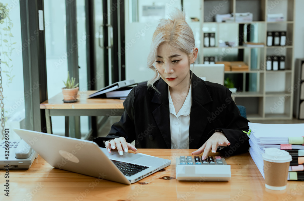 Friendly cheerful asian businesswoman smiling, people emotions and casual concept, positive woman working in office workspace. Friendly cheerful asian businesswoman smiling, people emotions and casual concept, positive woman working in office workspace.
