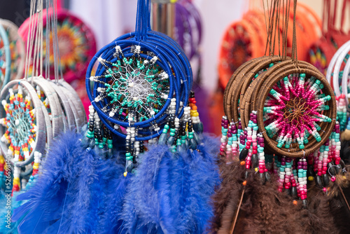 Dream catchers on souvenir market. Colourful dreamcatchers, native american ritual amulet. photo