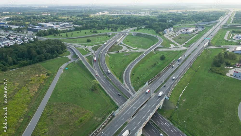 Aerial view of cars driving on round intersection in city, Transportation roundabout infrastructure, Highway road junction in Wroclaw, Poland Aerial view of cars driving on round intersection in city, Transportation roundabout infrastructure, Highway road junction in Wroclaw, Poland