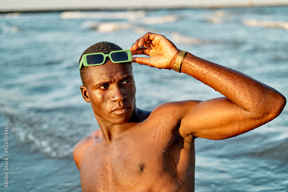 Shirtless black man in sea water Stock Photo Adobe Stock