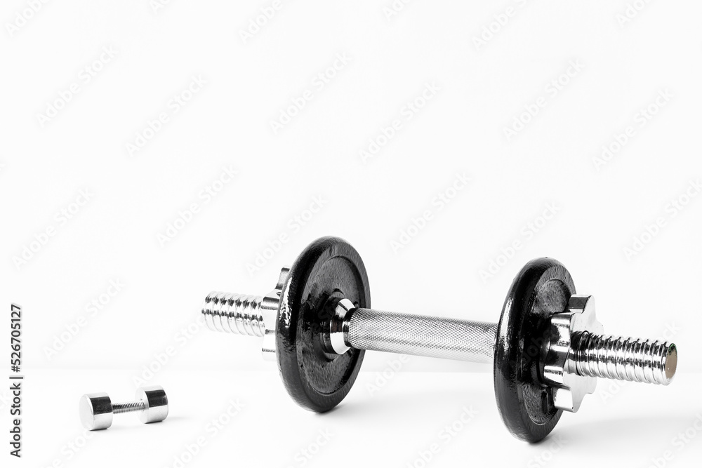 Fototapeta premium dumbbell Exercise for good health. backdrop for idea concept art work design or add text