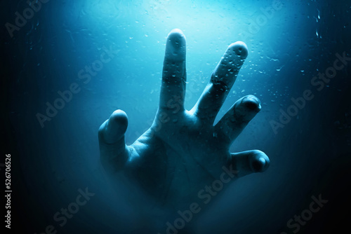 Картината върху платно Human hand drowning, Halloween theme