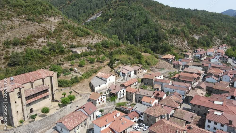 Aerial view from drone flying forward over the town of Garde, Spain. Aerial view from drone flying forward over the town of Garde, Spain.