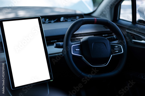 Monitor in EV car with isolated blank screen use for GPS. Isolated on white with clipping path. Car display with blank screen. Modern car interior details. © Nuttapong punna