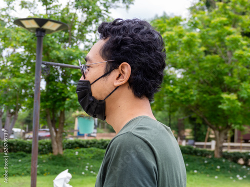 Man wearing black glass and nature at Sukhothai  Thailand.