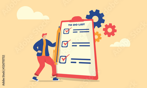 make a to do list in order to achieve the target, illustrated by someone holding a pencil to write a to do list.