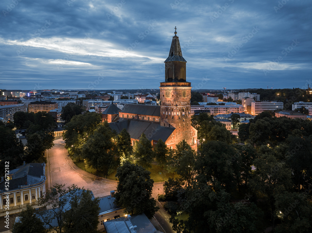Aerial view of illuminated Turku Cathedral in summer night in Turku, Finland