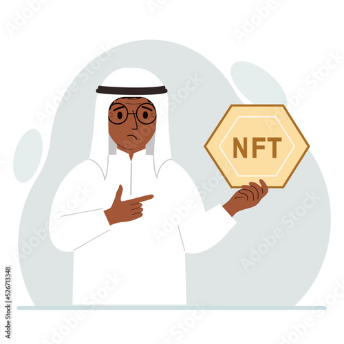 NFT concept. The muslim man is holding nft in his hand. Works of art using non-fungible tokens for auctions, sale and purchase of works of art.