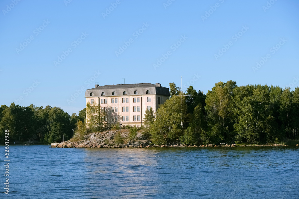 Castle by the sea in the forest, photographed from the sea