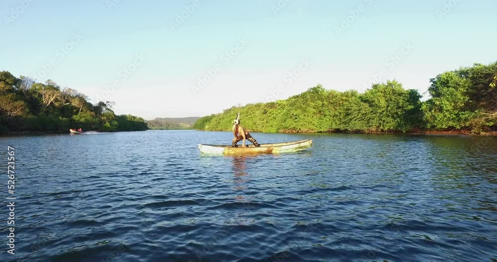 man dancing on ancient raft in oaxaca mexico man dancing on ancient raft in oaxaca mexico