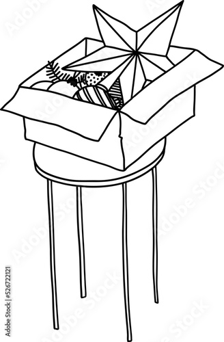 Box with Christmas toys on a stool. Doodle vector illustration of Christmas tree decor. A hand-drawn toy for decoration inside an open old box. The star is stored in an old package and isolated.