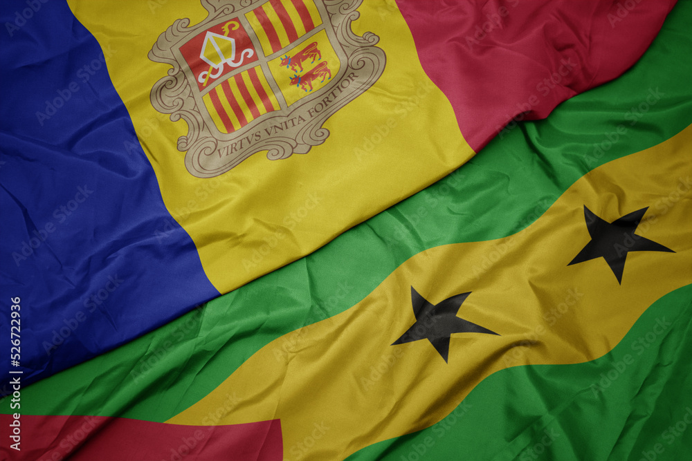 waving colorful flag of sao tome and principe and national flag of andorra.