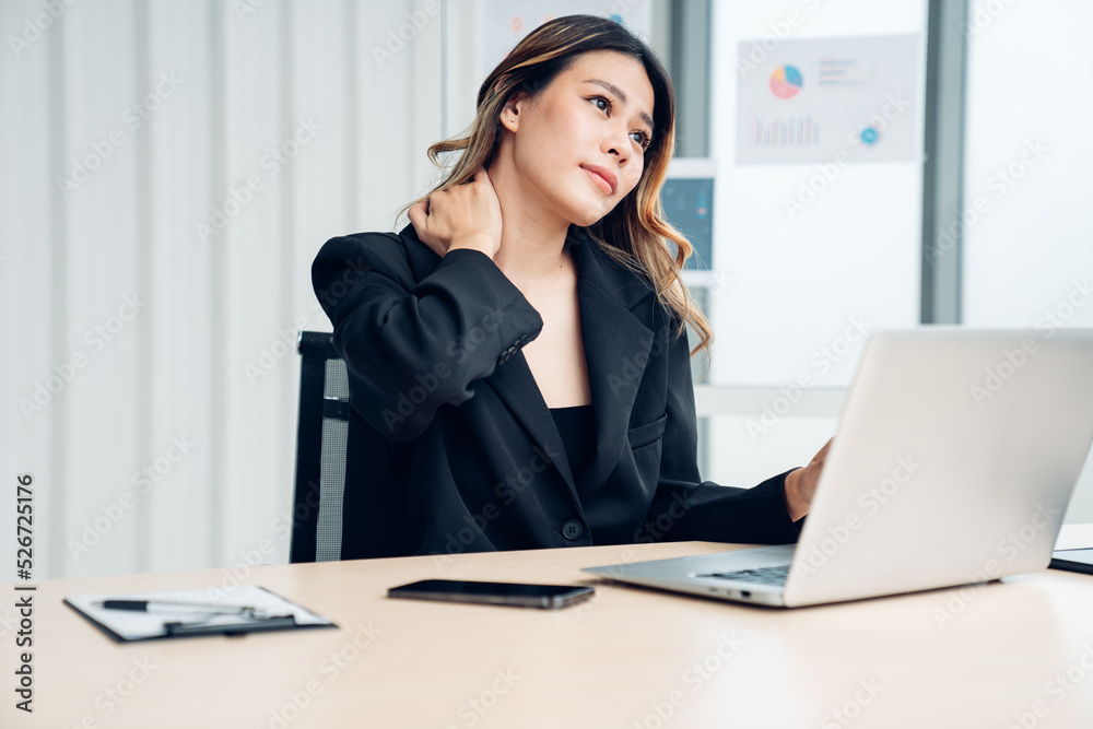 Successful asian businesswoman working at her office desk, Concept of business risk analysis and assessment Successful asian businesswoman working at her office desk, Concept of business risk analysis and assessment