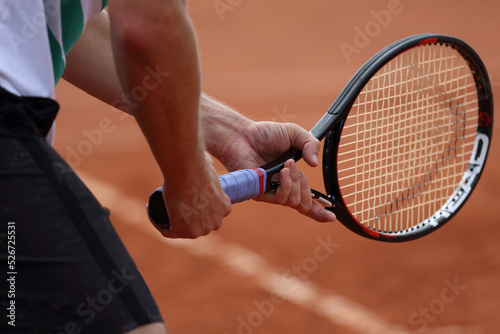 tennis player with racket © AlexZlat