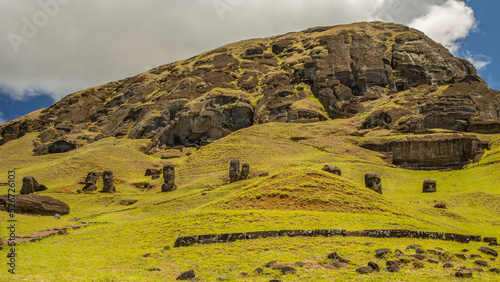 Moai statues in the Rano Raraku Volcano in Easter Island, Rapa Nui National Park, Chile photo